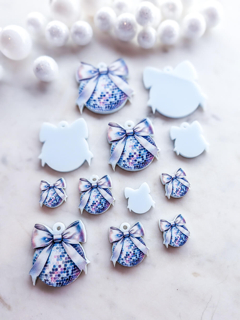 Silver Disco Bauble on Light Blue Acrylic